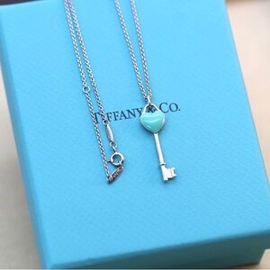 Tiffany & Co. Silver Key Necklace with Blue Heart